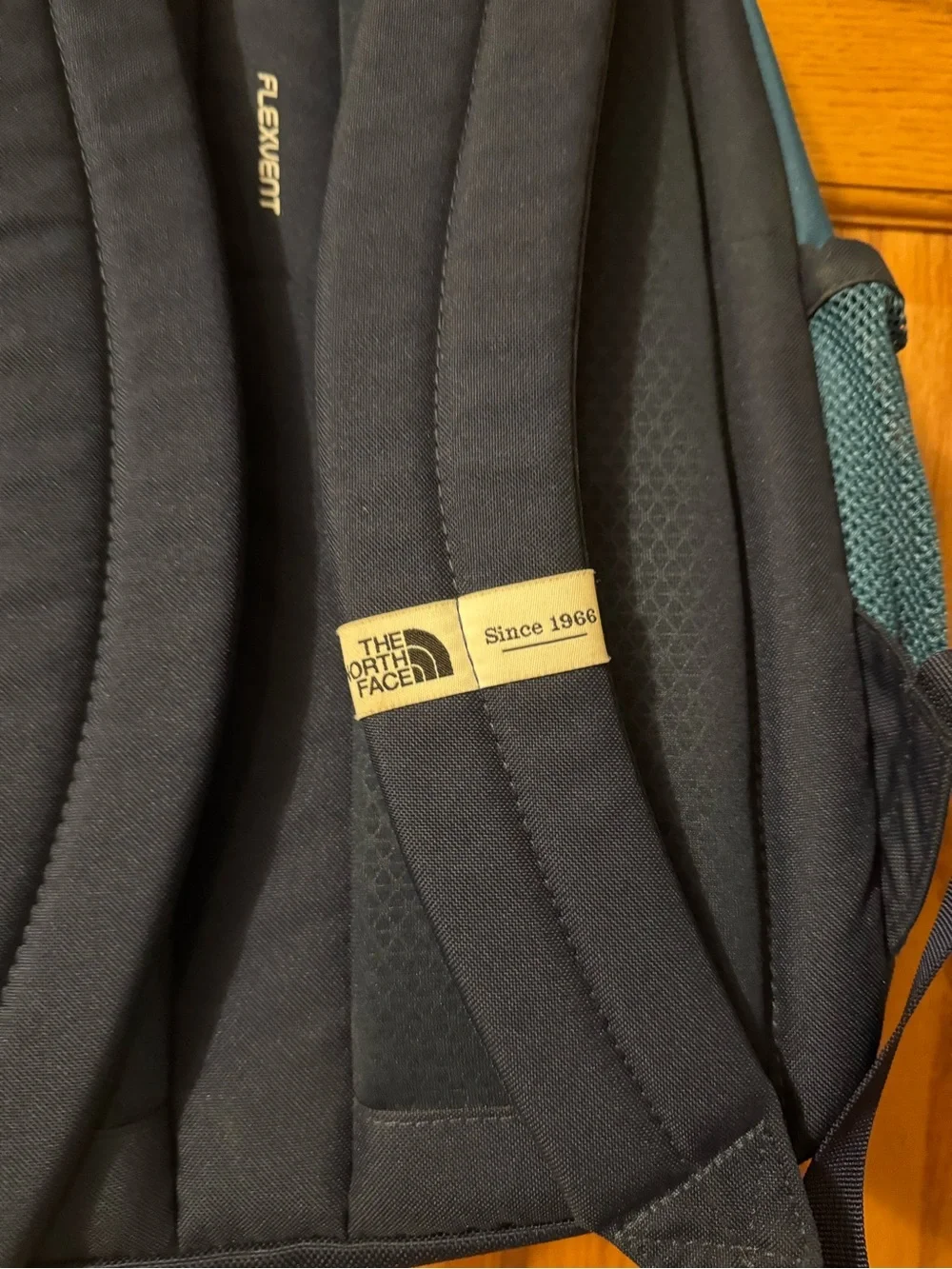 The North Face  Bozer backpack, retro orange, navy, dark teal